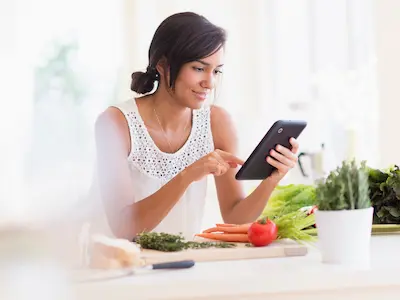 A woman taking a health risk assessment on his phone