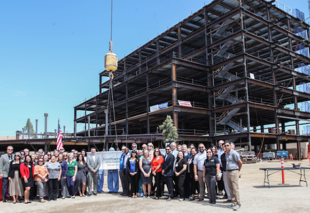 Inland Valley staff members standing outside the new tower